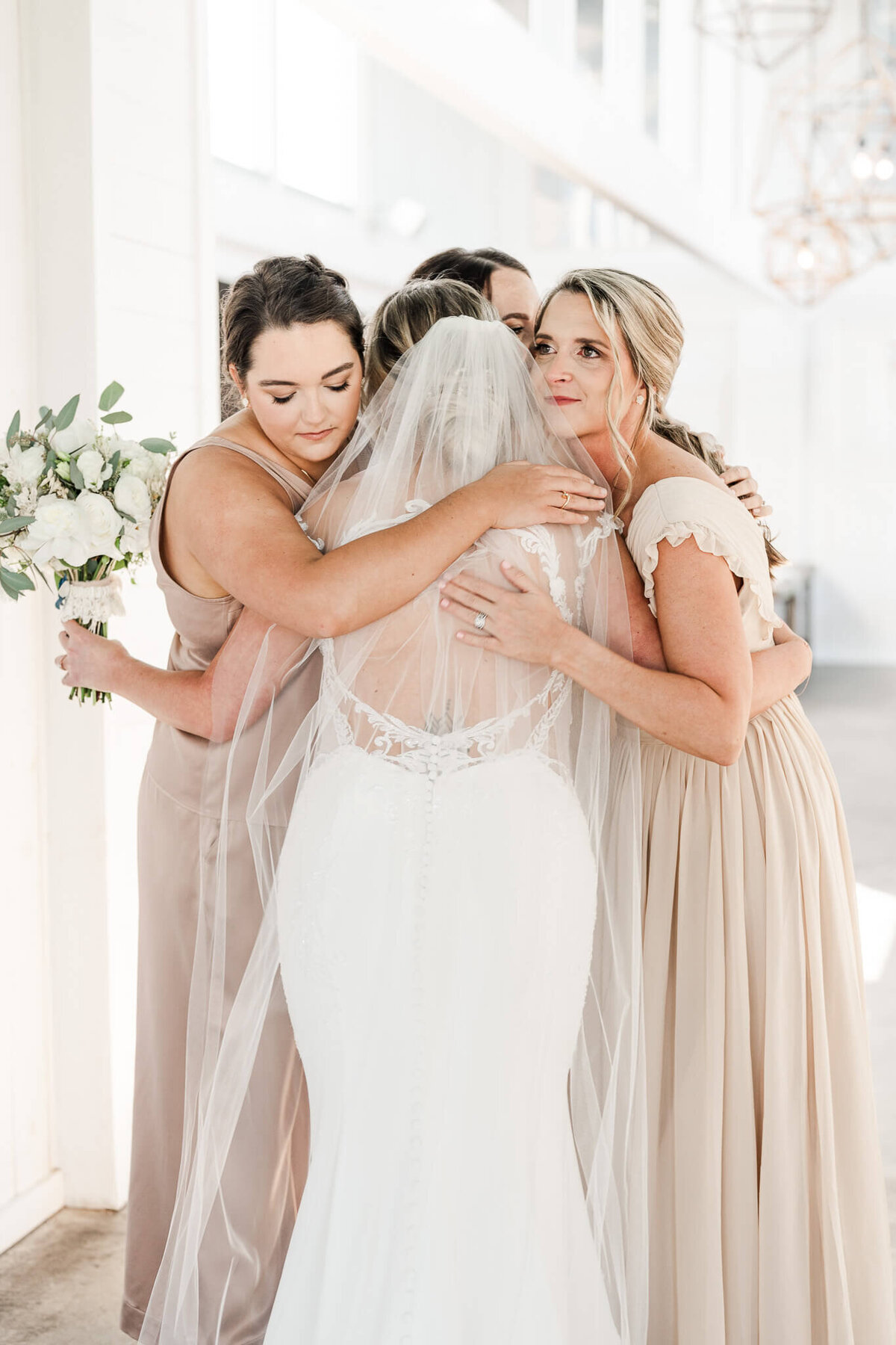 The-Gulf-Florida-Wedding-Photos-Video-Film-Megan-Chase-Bride-Emotional-Bridesmaids-Reveal-Hug