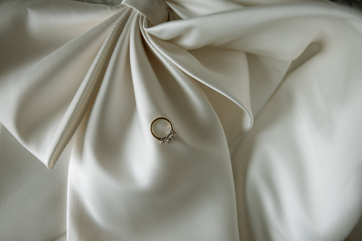 Stunning ring shot featuring bow shot in natural light by destination photographer. 
