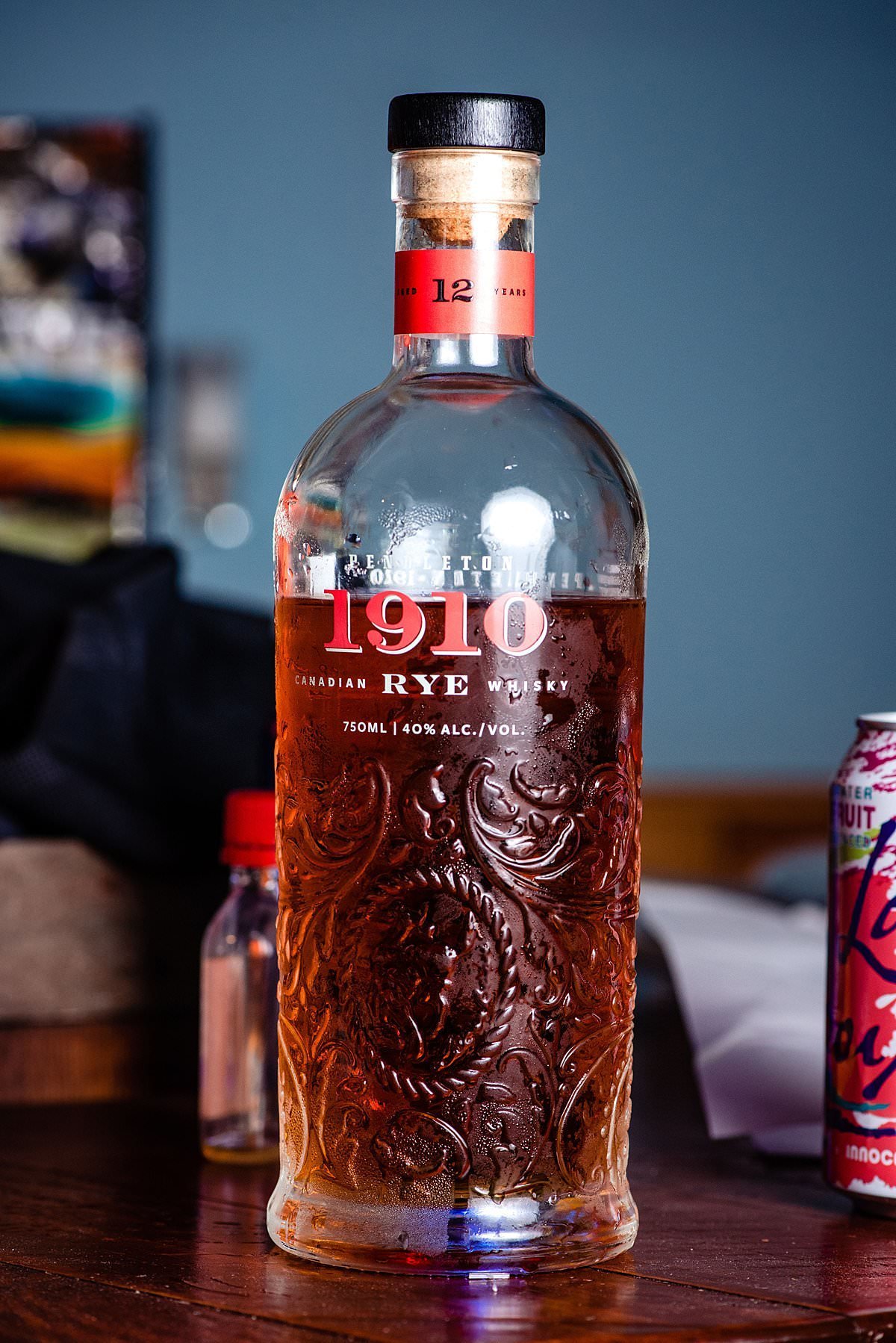 Close up photo of a bottle of 1910 Rye Whisky