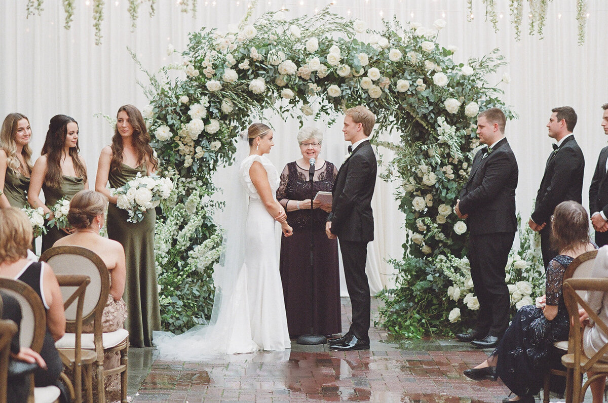 Chicago Illuminating Co. Tent Wedding with Lush Floral Arch_20