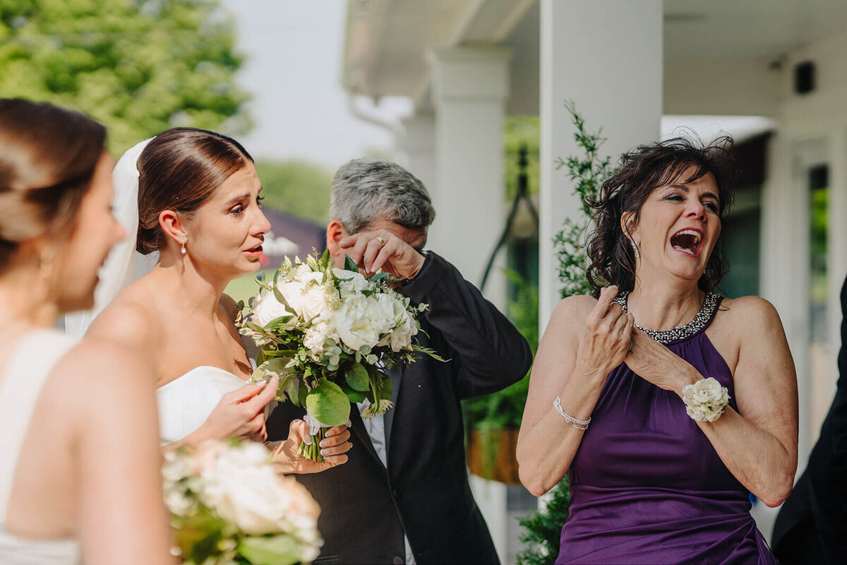 Bride with guests at Canandaigua Country Club wedding, NY