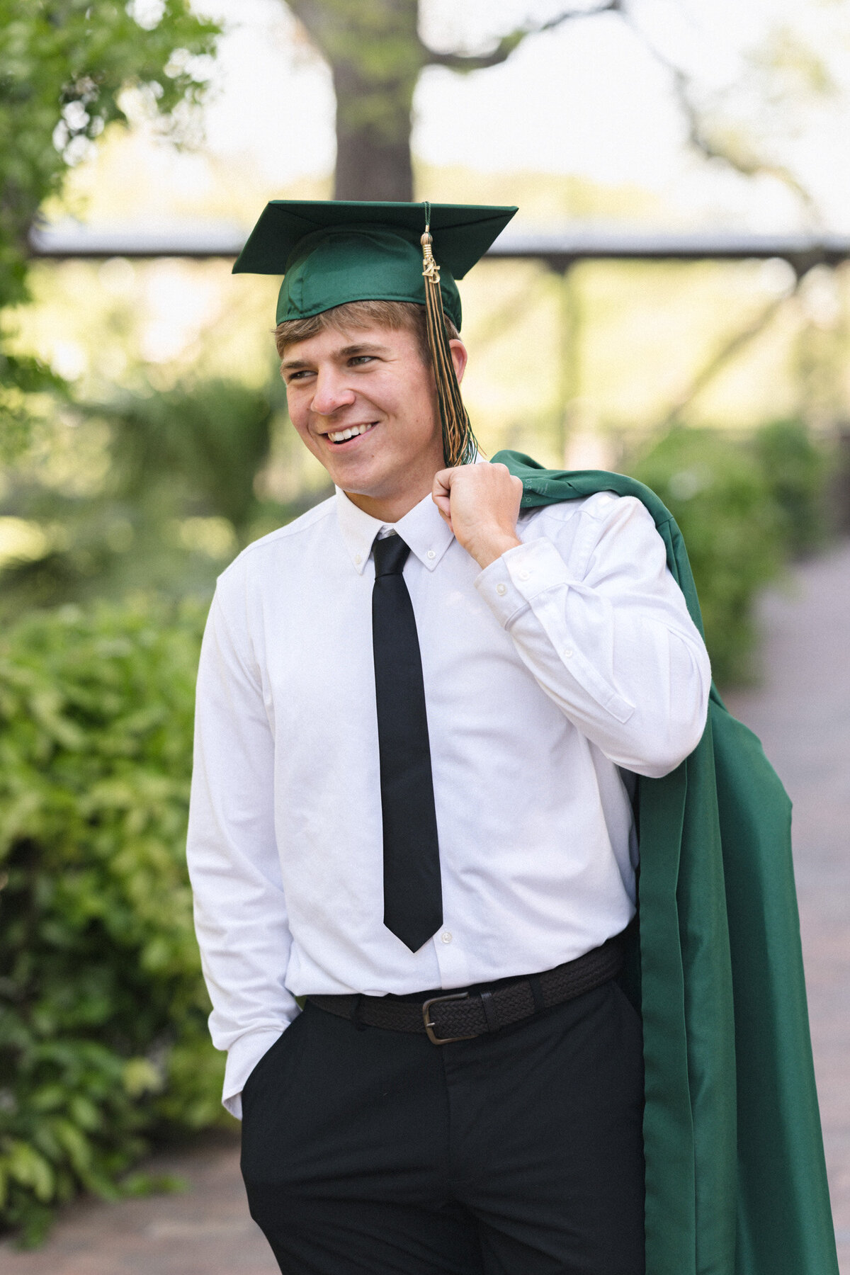 San Antonio senior cap and gown photo of a graduate at the Pearl Brewery.
