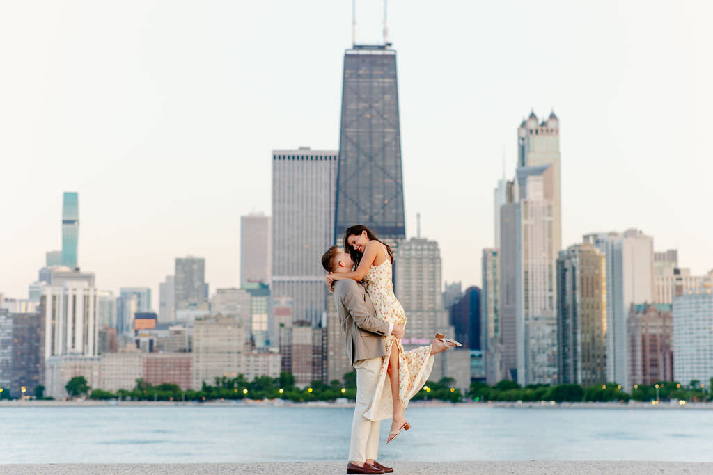 An engagement photography session at The Wrigley Building and North Ave Beach in Chicago, Illinois - 28