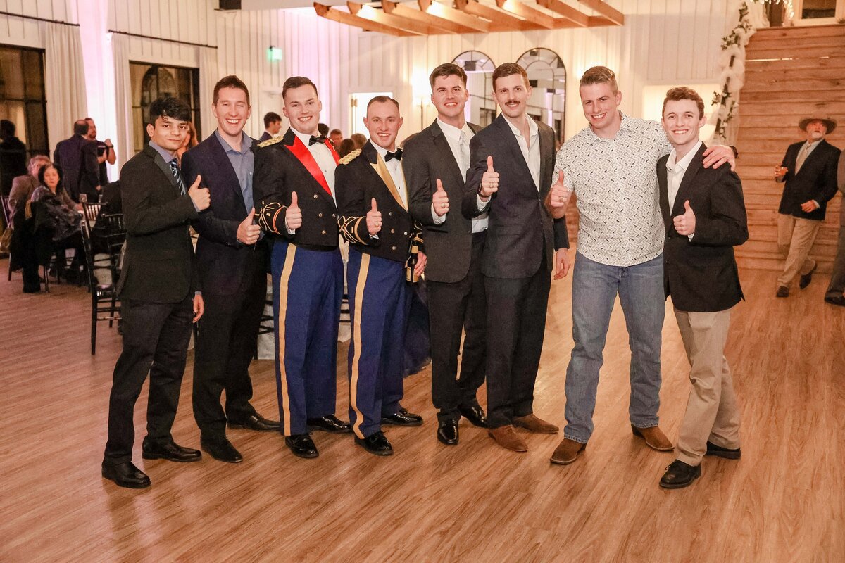 Texas Aggie wedding corp of cadets group together and gig'em