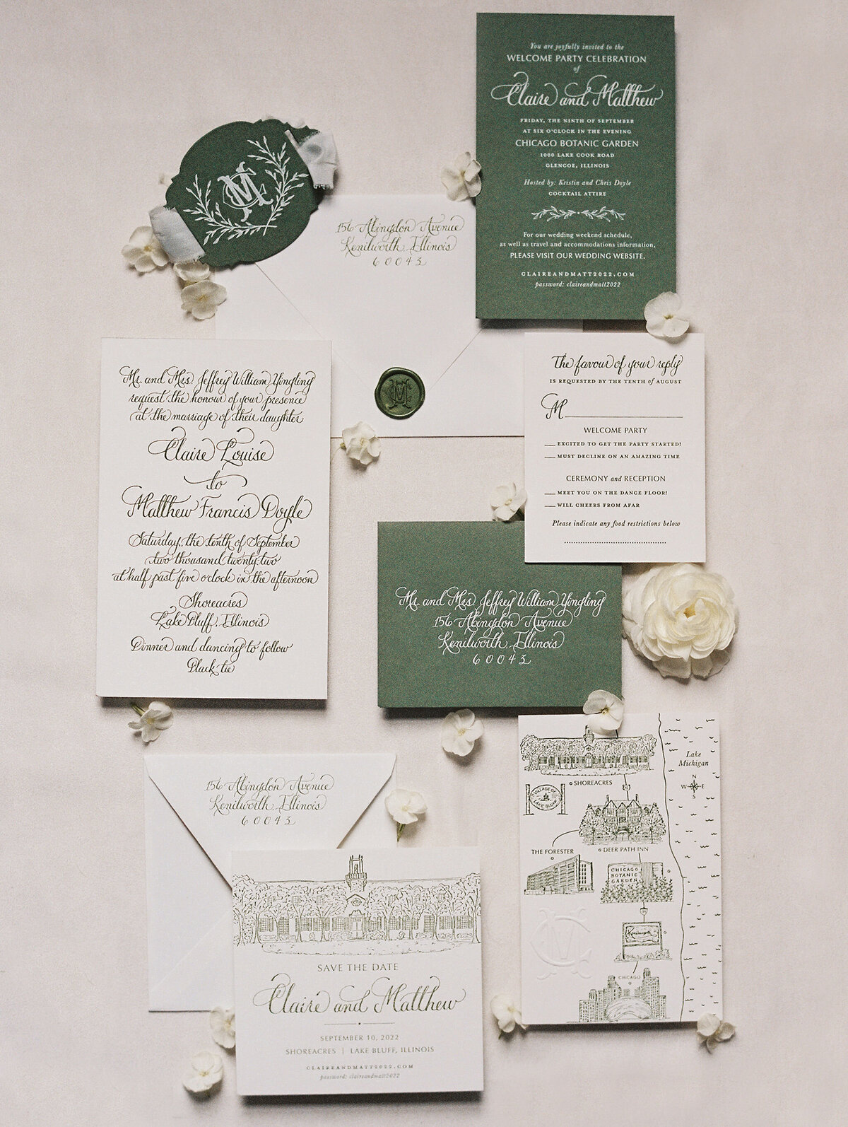 Close up of all the invitations for the wedding at the Shoreacres CC.