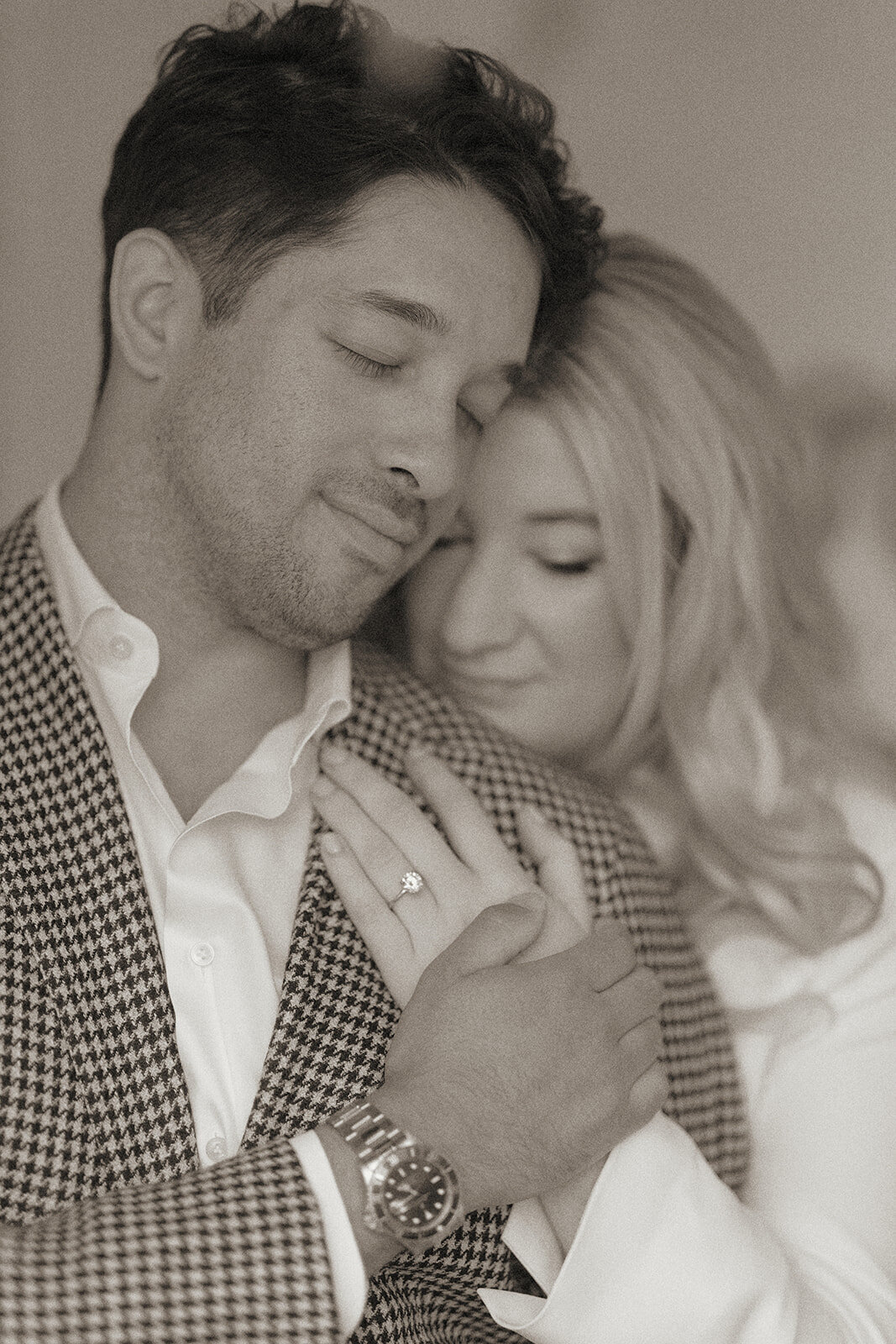 groom-and-bride-hug-black-and-white-HBICWeddings