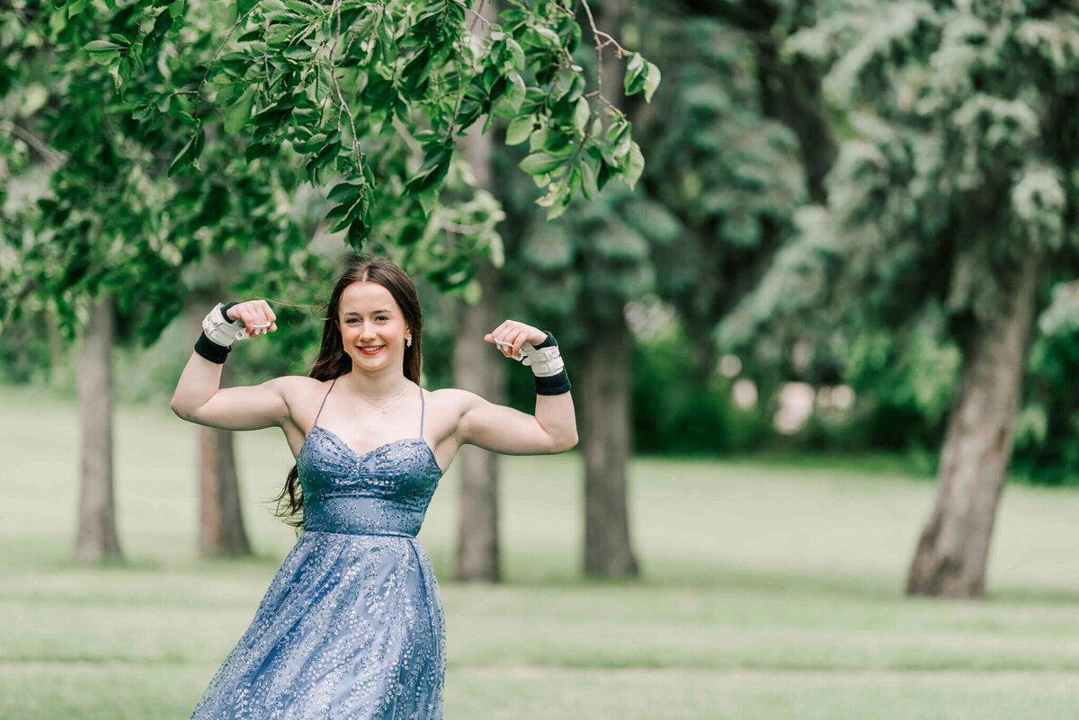 Flexing her muscles. 