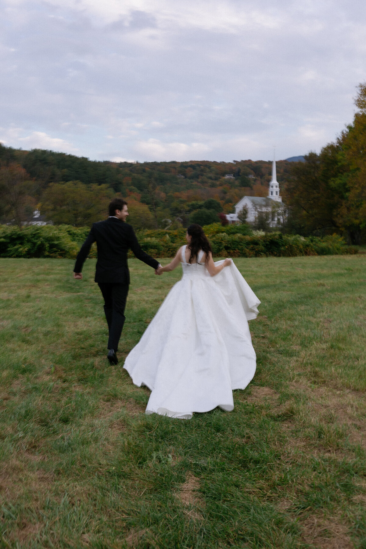 Vermont & New England Wedding Photographer | Sincerely Liz Photography Documentary Wedding, Engagement, Elopement, Maternity and Newborn Photographer in New England | Bride and groom running in a field
