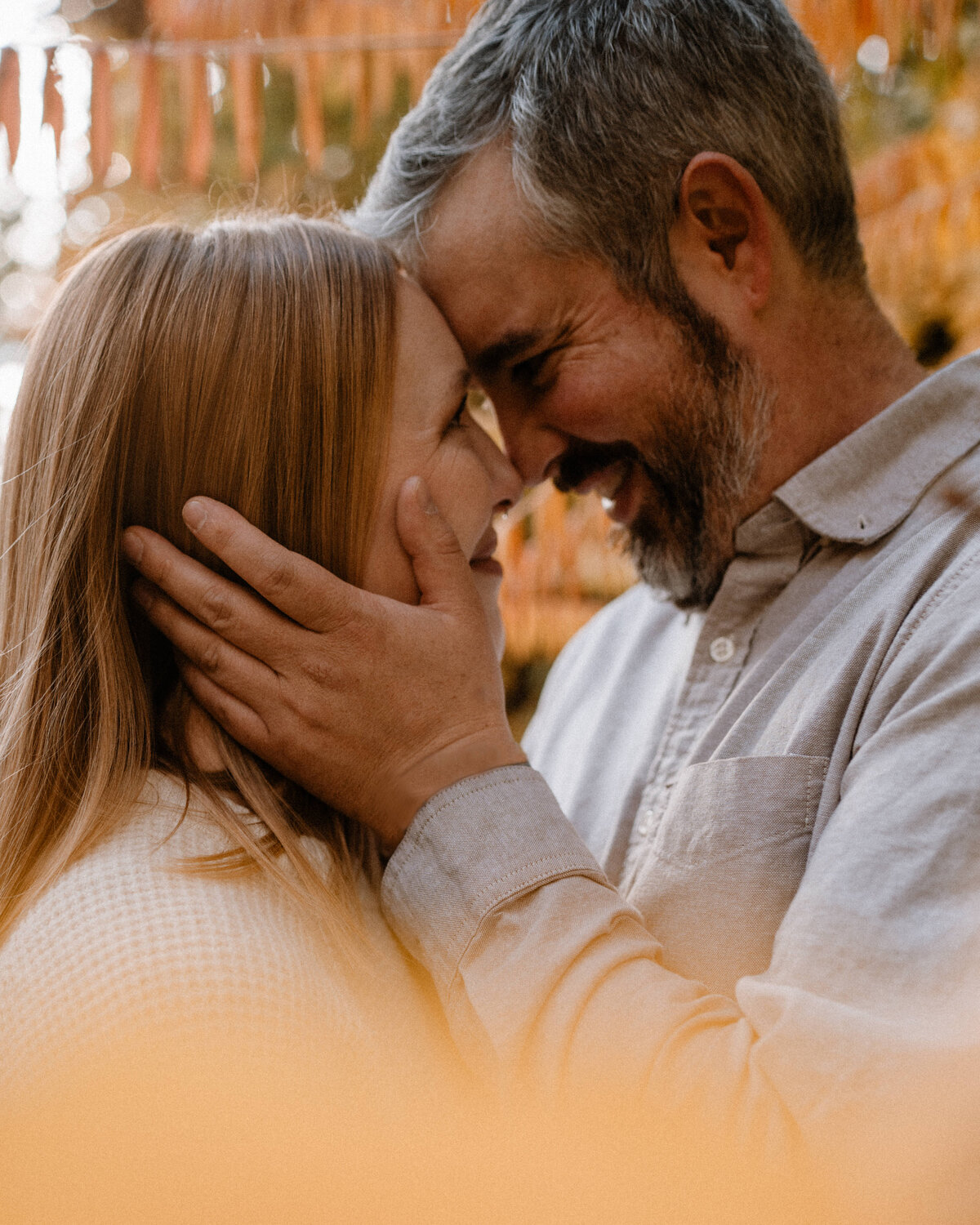A couple enjoys a relaxed walk through the park, capturing a candid and natural moment in Spokane, Washington.