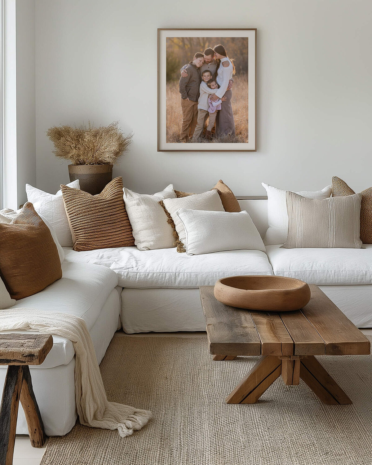 Family portrait on display in a neutral living room.
