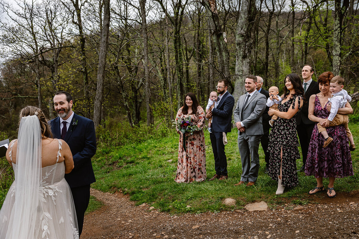 A couple exchanges their vow in Shenandoah National Park, surrounded by their immediate family.