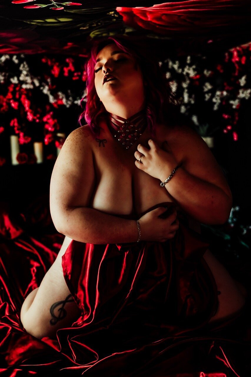 Boudoir photography woman in red sheets Lubbock, Texas Boudoir photographer in Amarillo TX