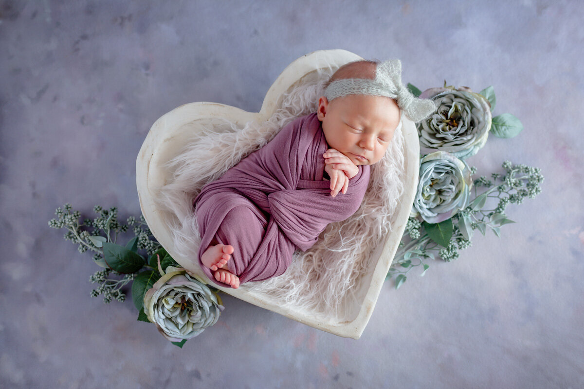 parker-newborn-in-home-session-wrapped-baby-purple-flowers
