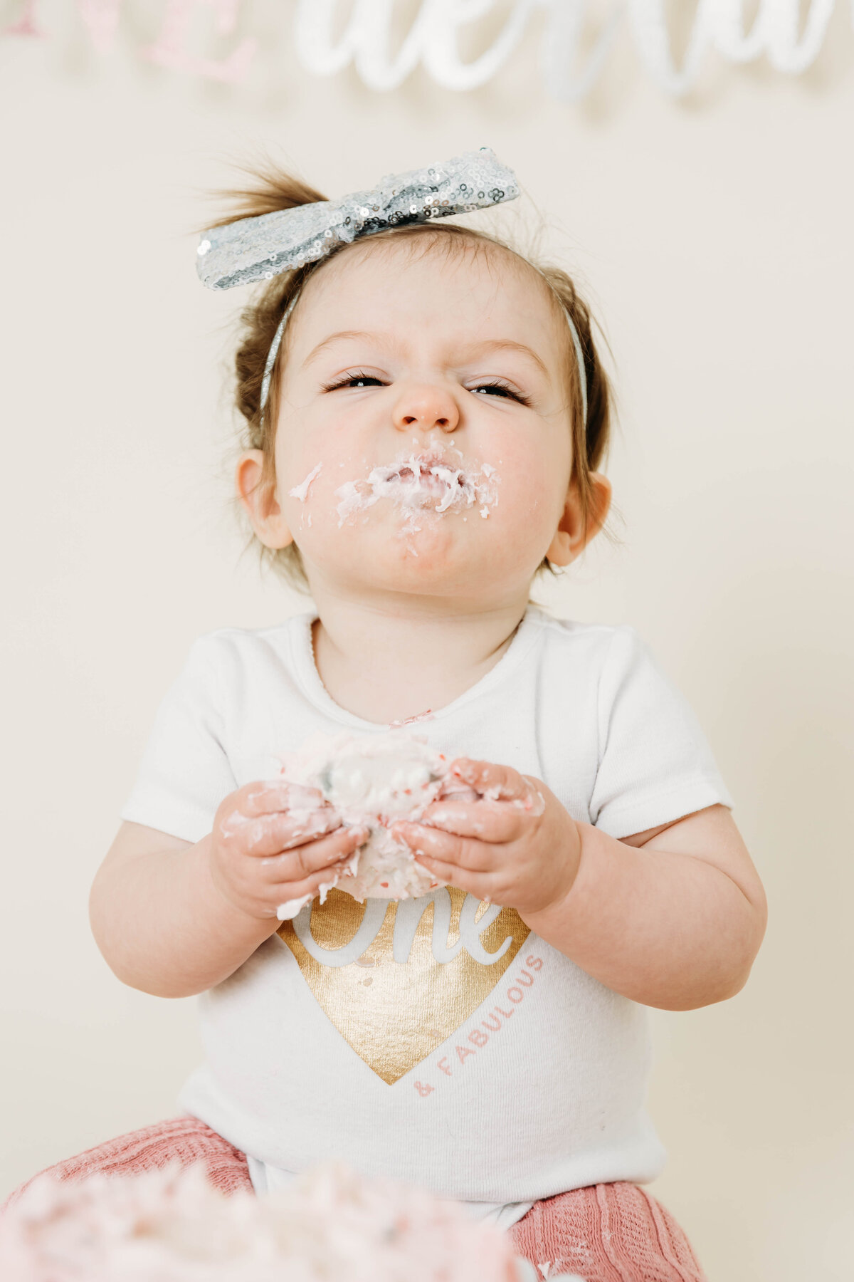 messy cake face little girl by harrisburg pa baby photographer