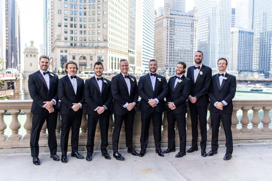 groom-groomsmen-wrigley-plaza-chicago-river