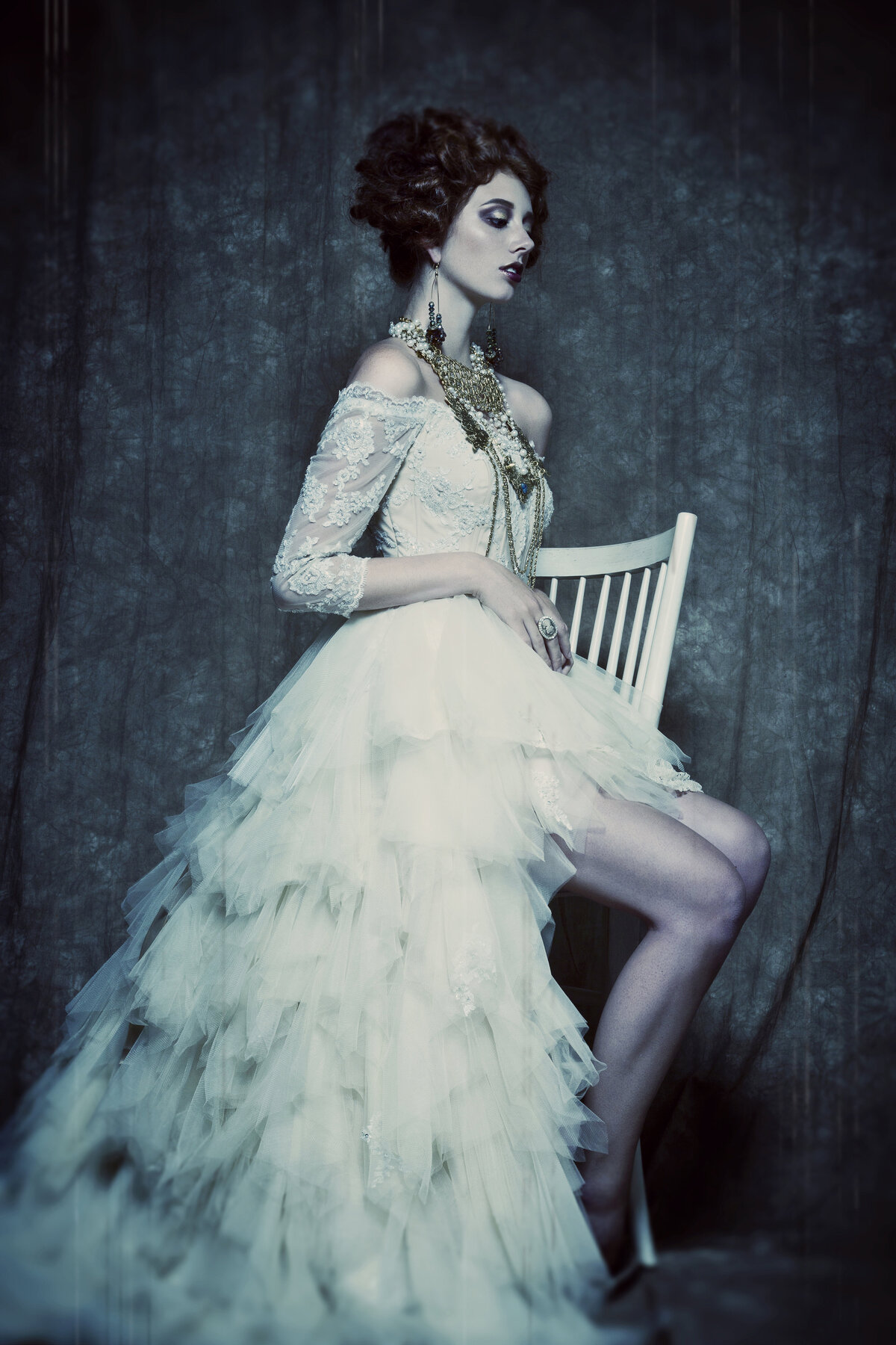 Editorial-fashion-styling-model-gown-sitting