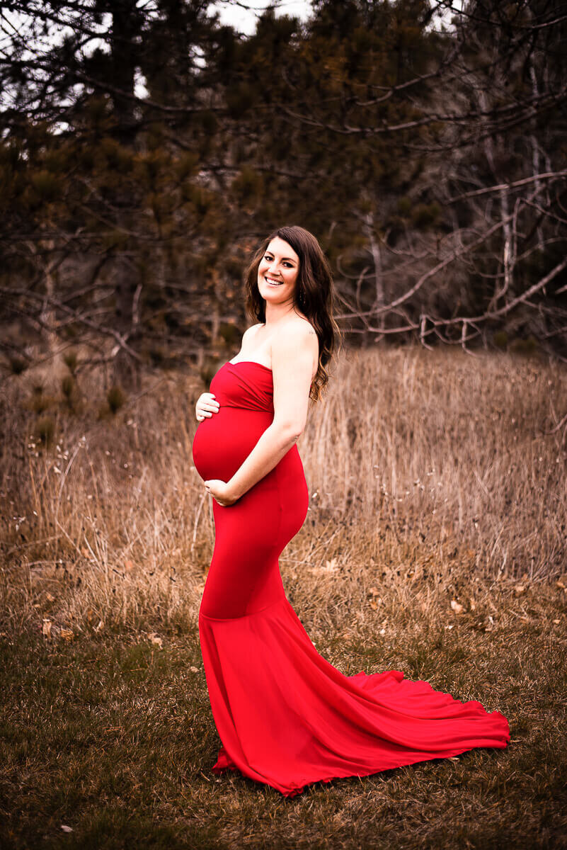 Expecting mom in red mermaid maternity gown for Toronto maternity photography