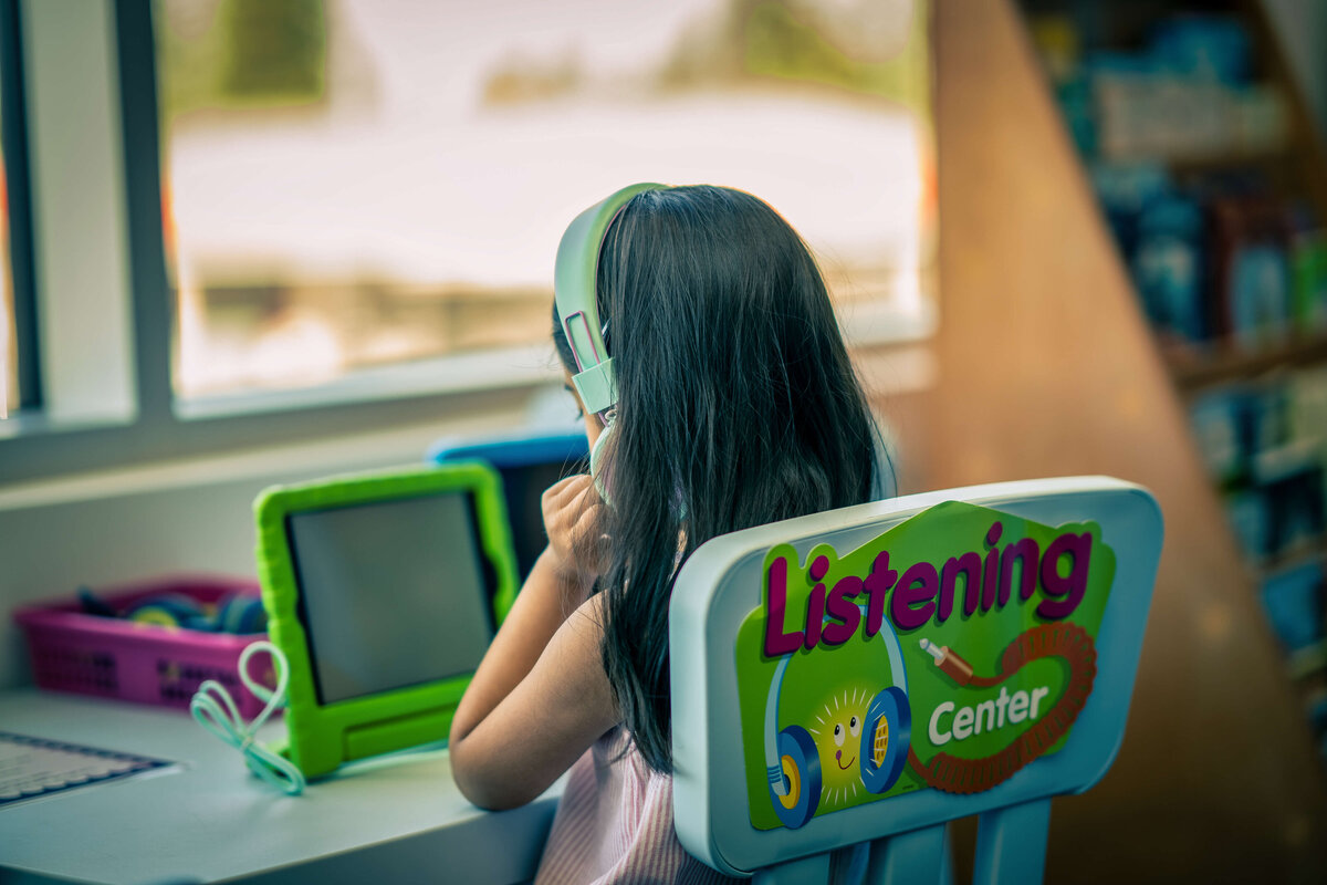 Young Girl Learning How To Read