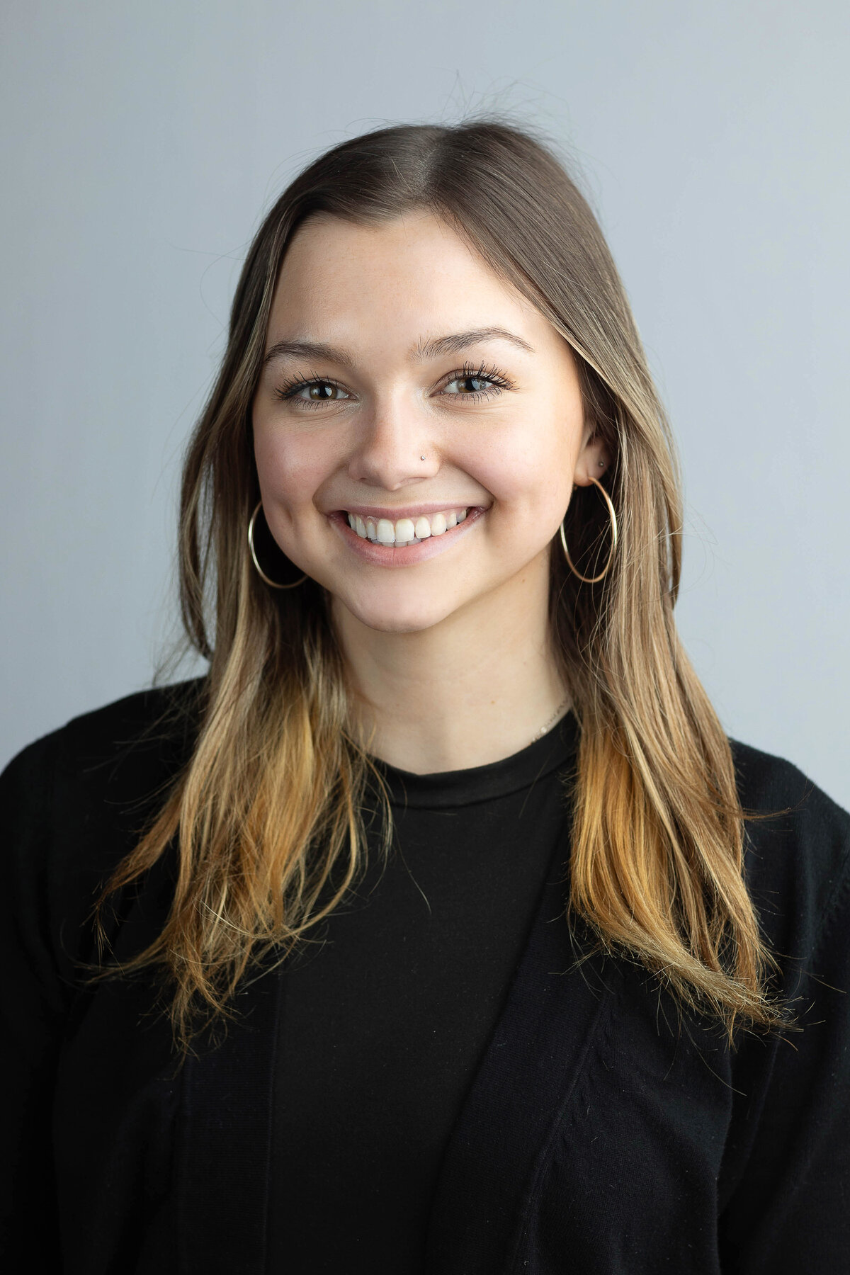 Headshot of a smiling young woman