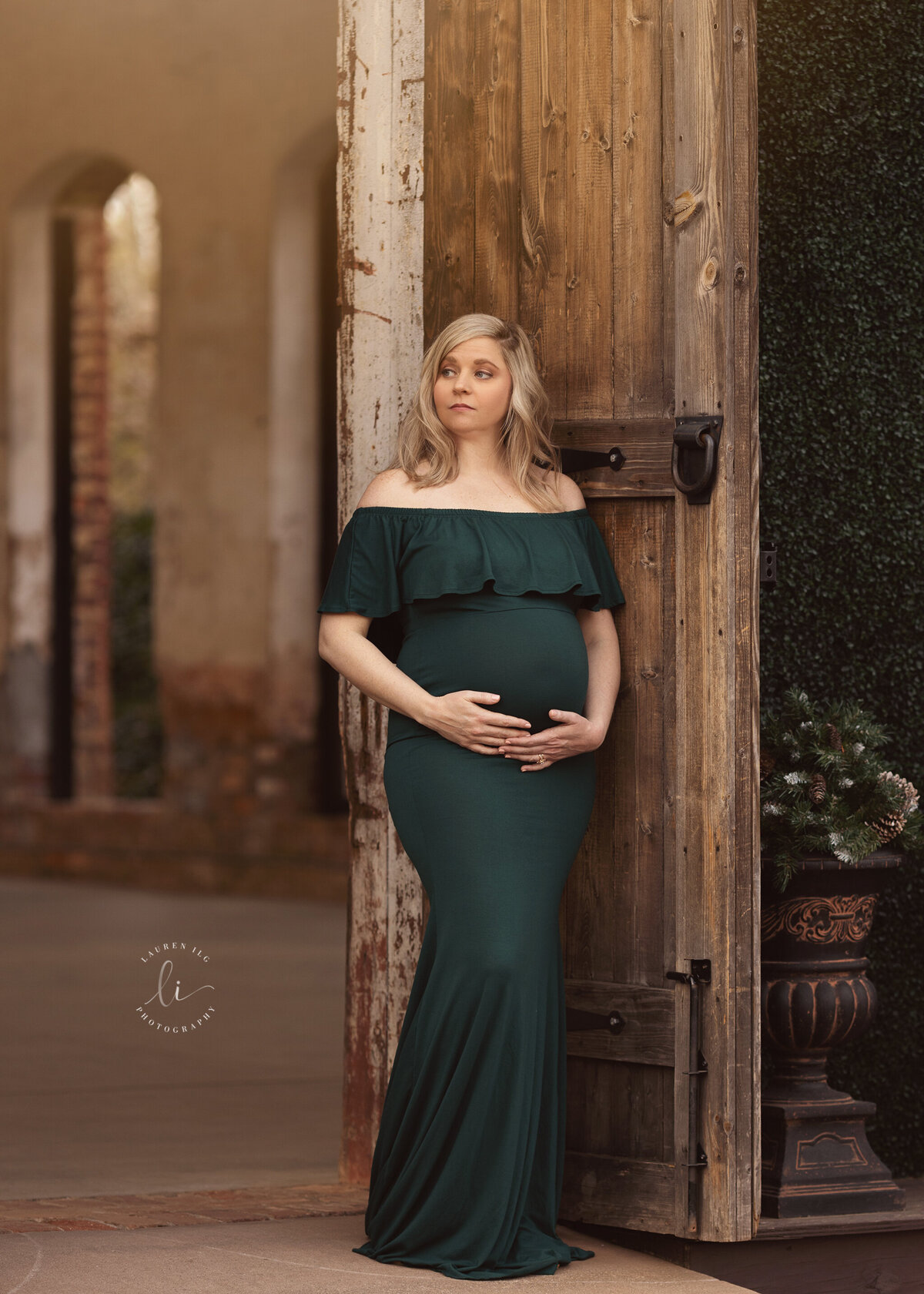 The Providence Cotton Mill maternity session mom standing by open door