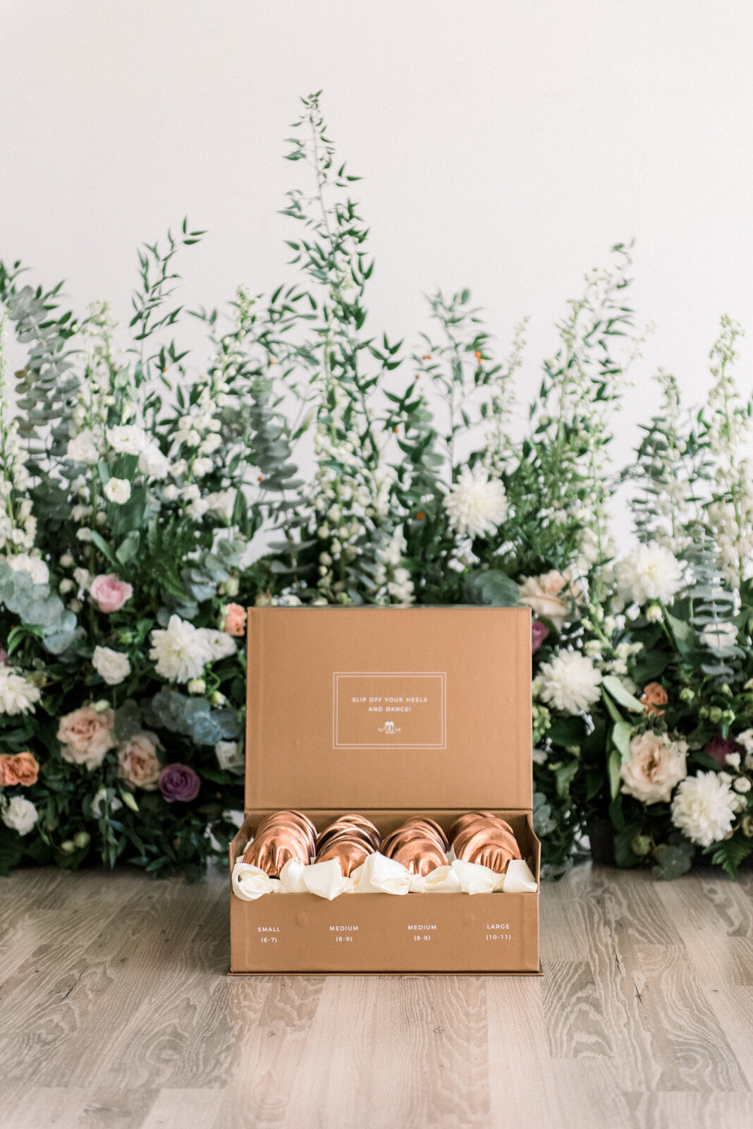 Stylish box of Rescue Flats, adorable foldable ballet flats based in Edmonton. Featured on the Brontë Bride Vendor Guide.