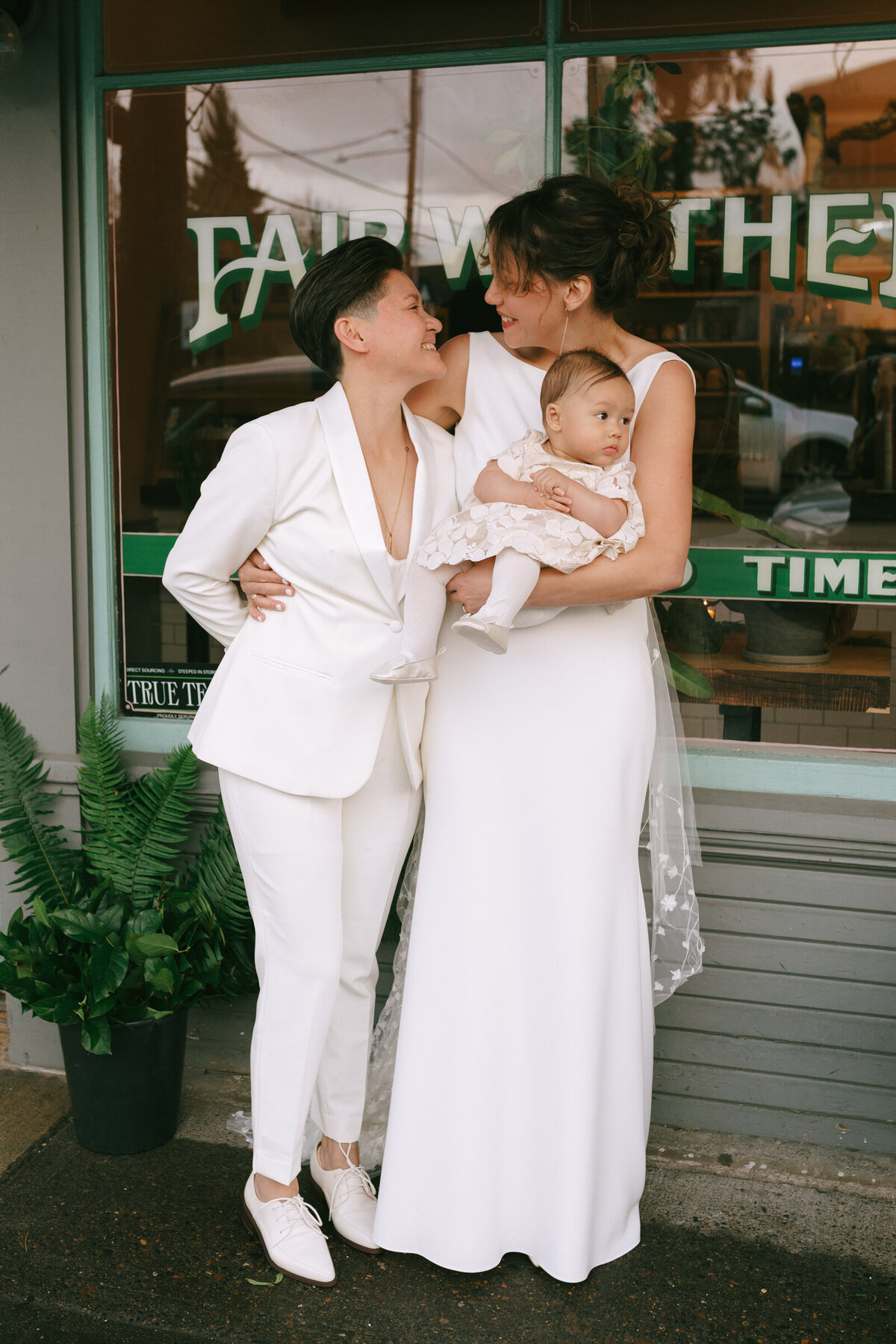 Photography of a couple celebrating LGBTQ love during an intimate wedding at Fairweather restaurant in Portland, Oregon. 