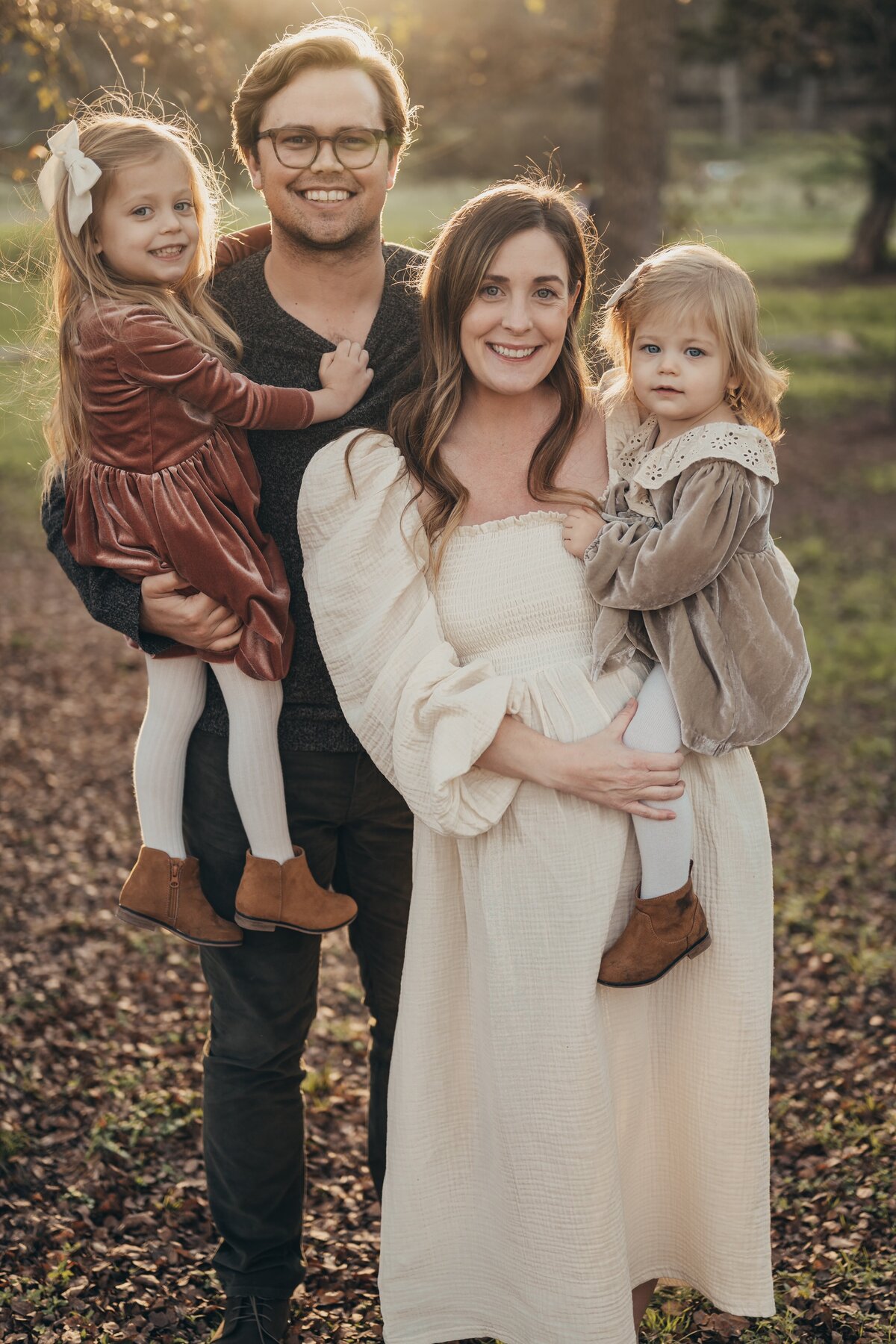 standing-parents-holding-kids