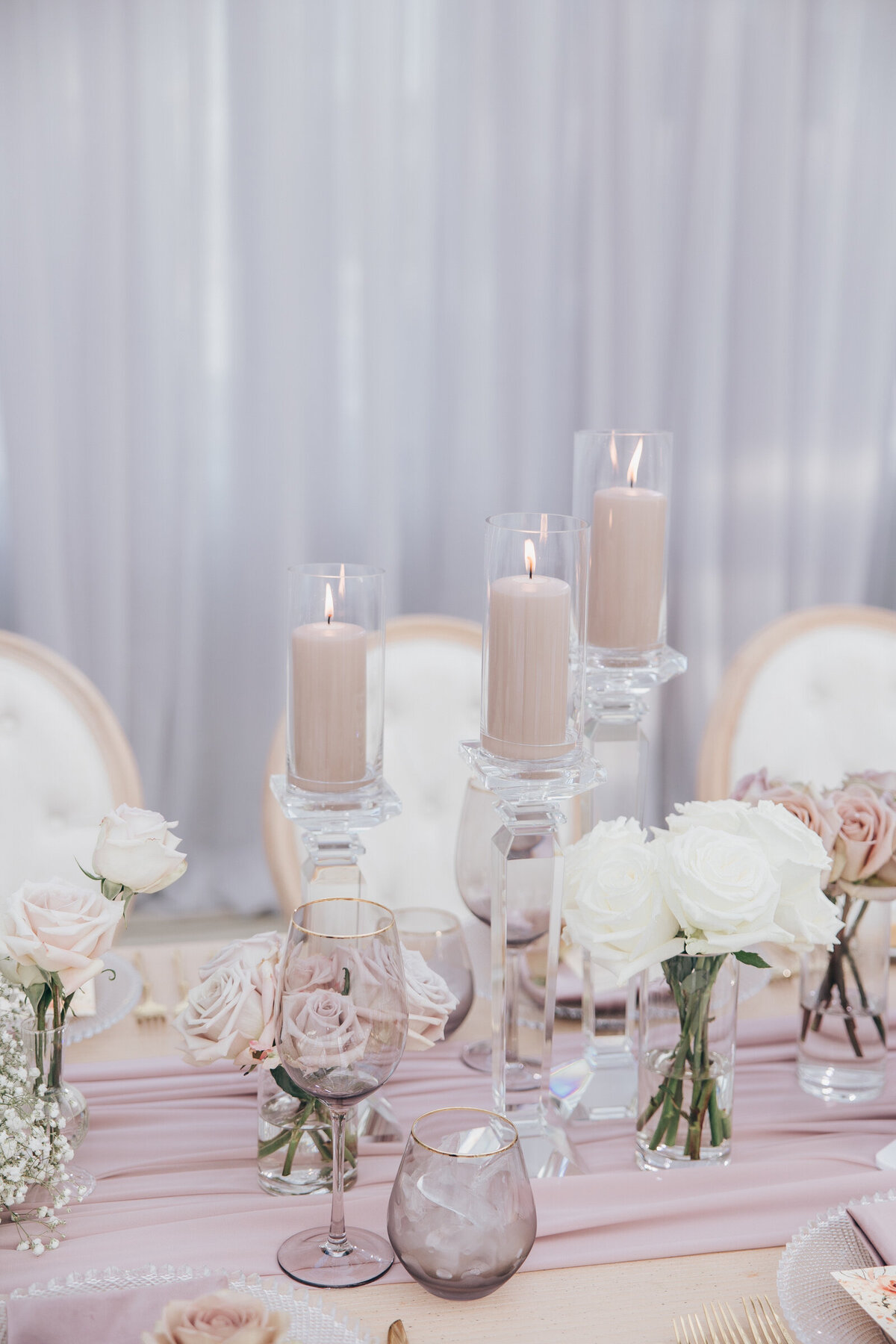 Crystal candlesticks at glamorous wedding reception
