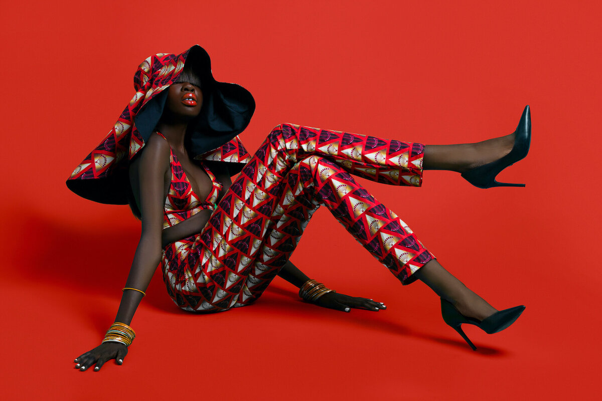black-woman-red-outfit-editorial-shoot-makeup
