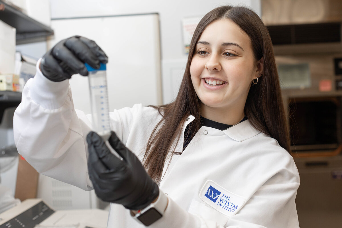 Female student holding a test tube