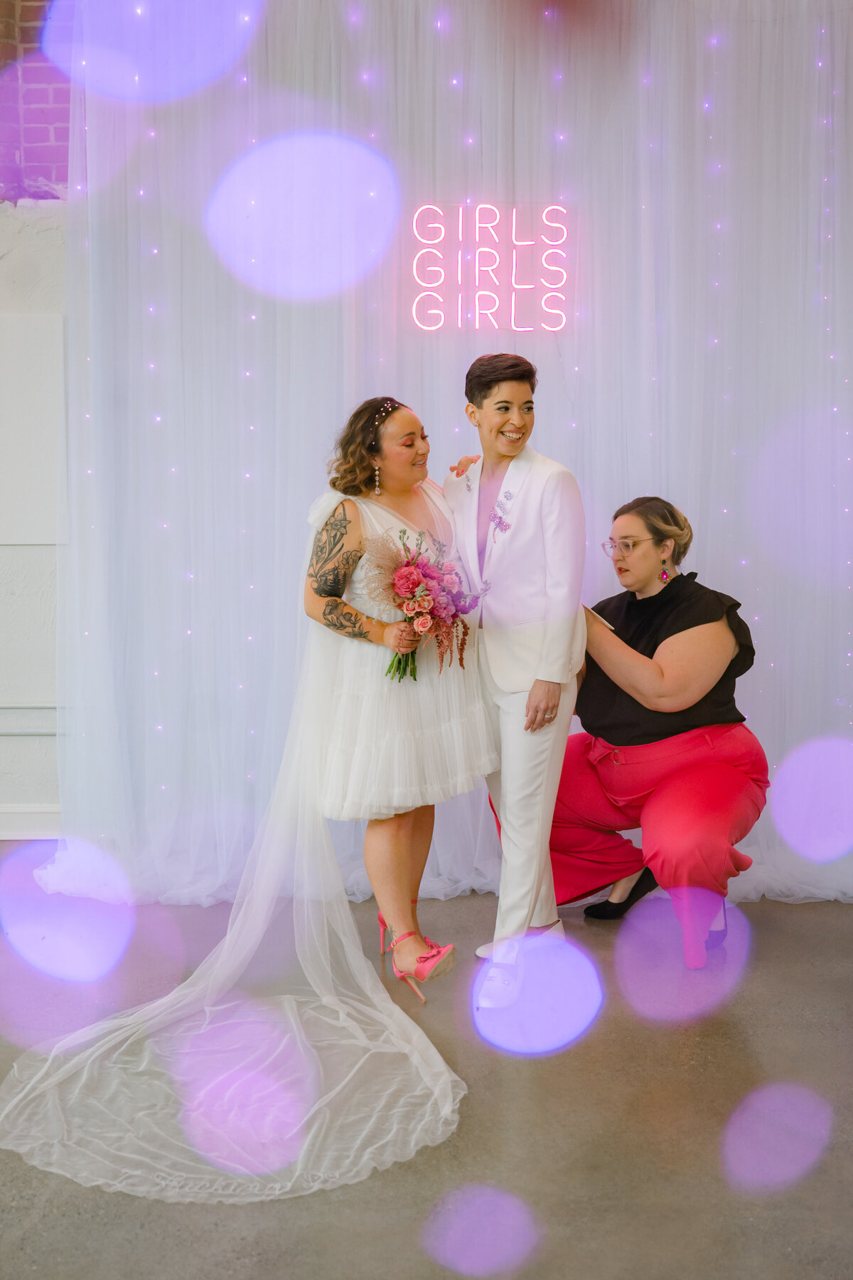 Rachel fixing bride's suit