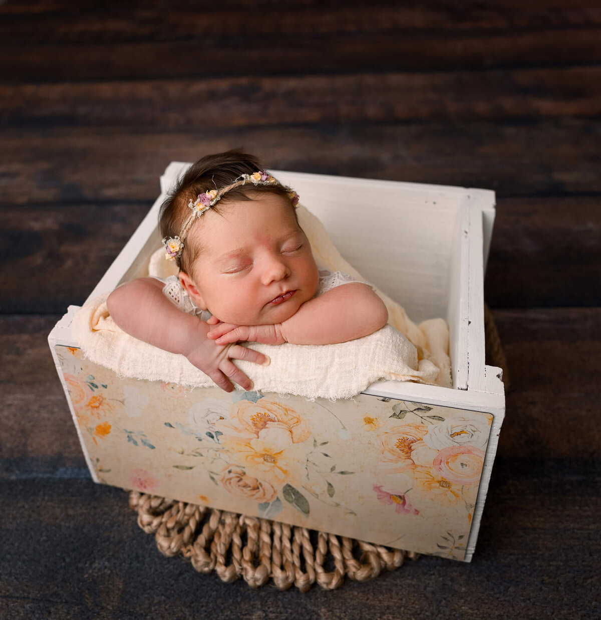 Baby girl newborn photos in a white box