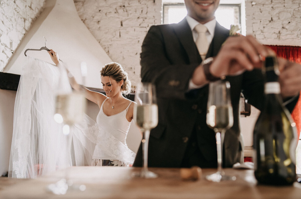 bride and groom getting ready