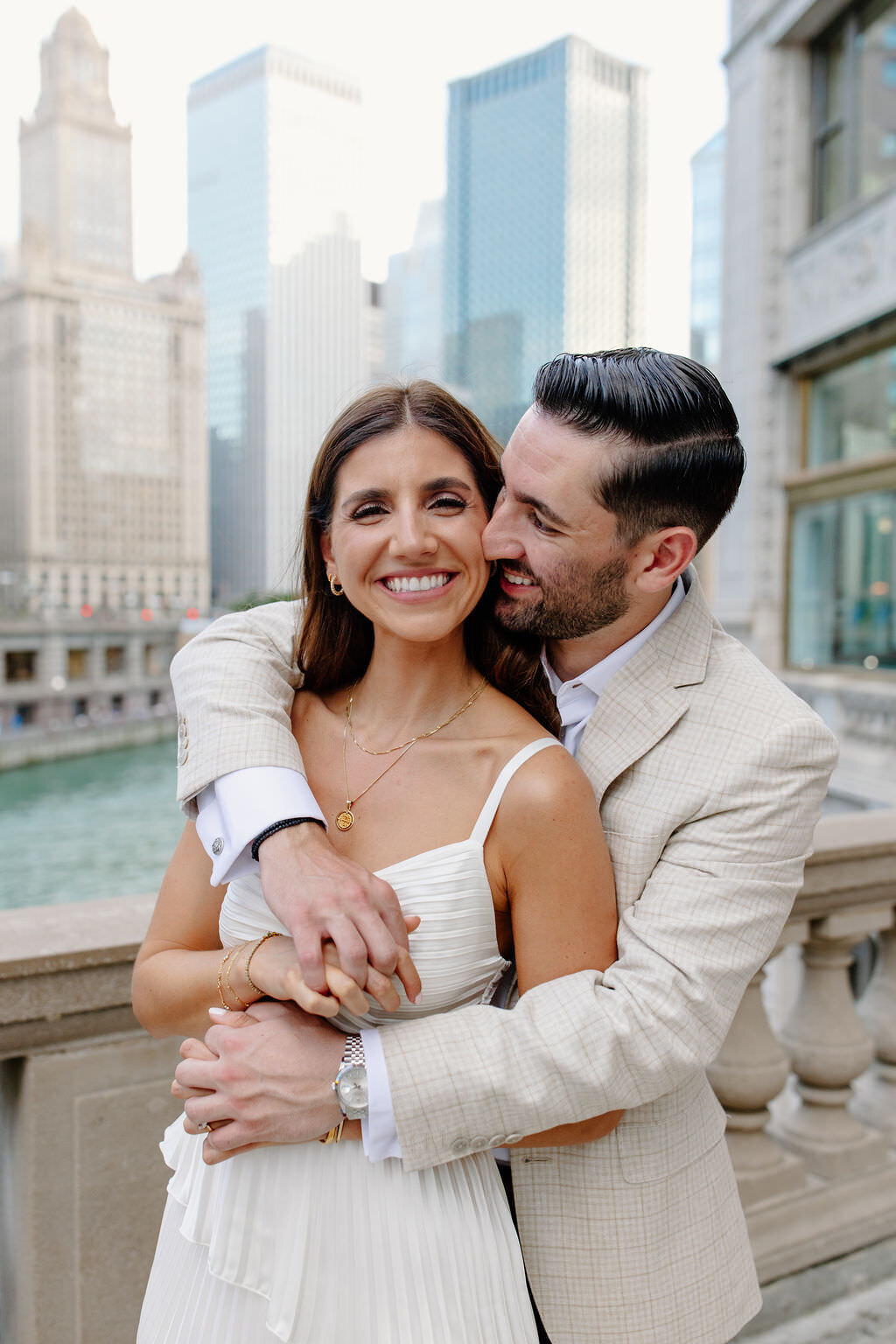 An engagement photography session at The Wrigley Building and North Ave Beach in Chicago, Illinois - 15
