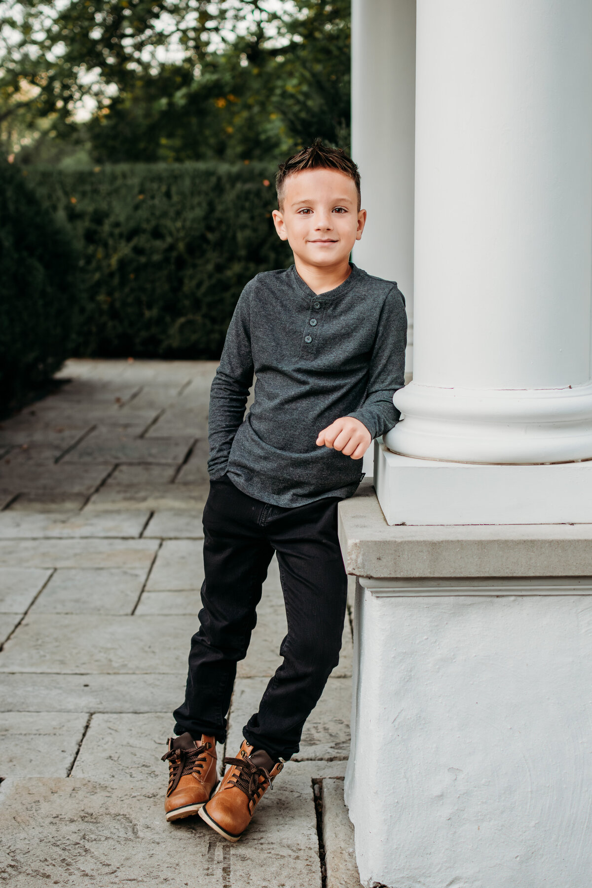 Portrait of a young boy in Hurley Gardens, Wheaton, IL, by Moments by Meli