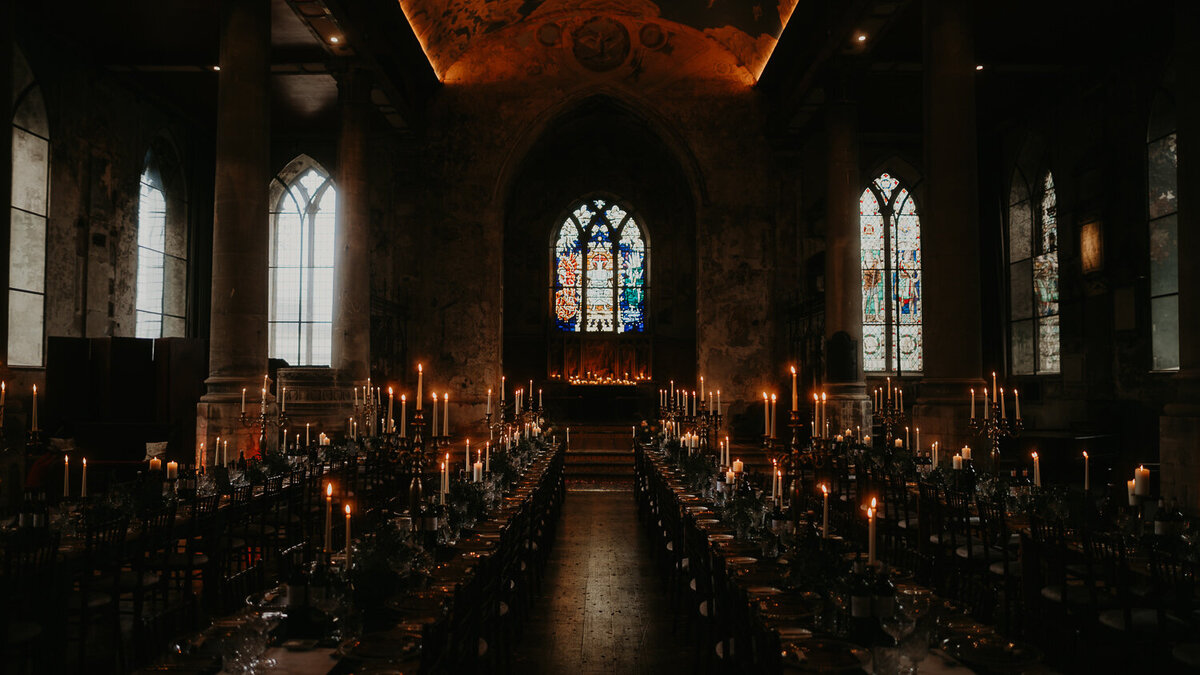 Wedding breakfast set up at The Mount Without with lots of candles. 