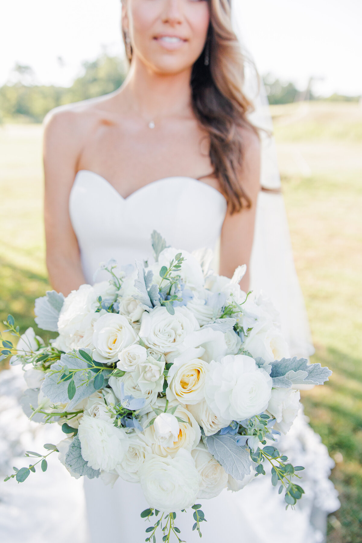 Close up of bride holding her wedding bouquet at a South Shore Country Club wedding