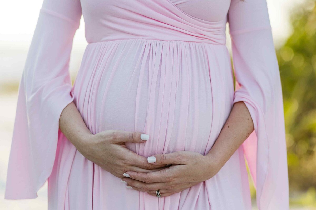 3-holding-baby-bump