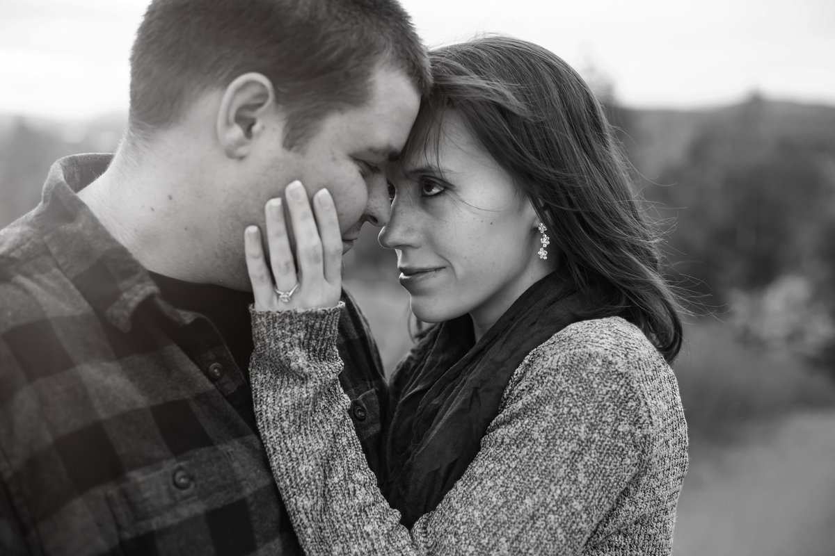Holding face close up bw