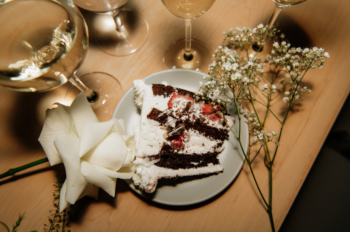 Wedding dessert table with cake and flowers