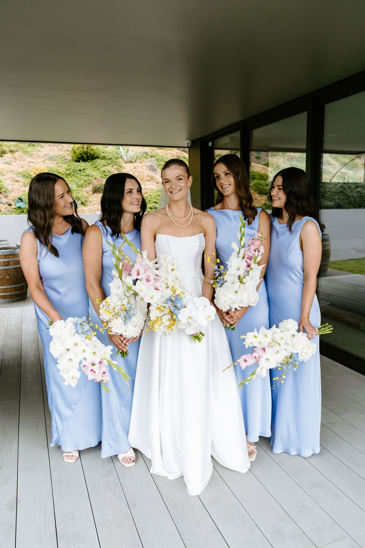 bride-bridalparty-bridesmaids-blue-hairandmakeup-flowers