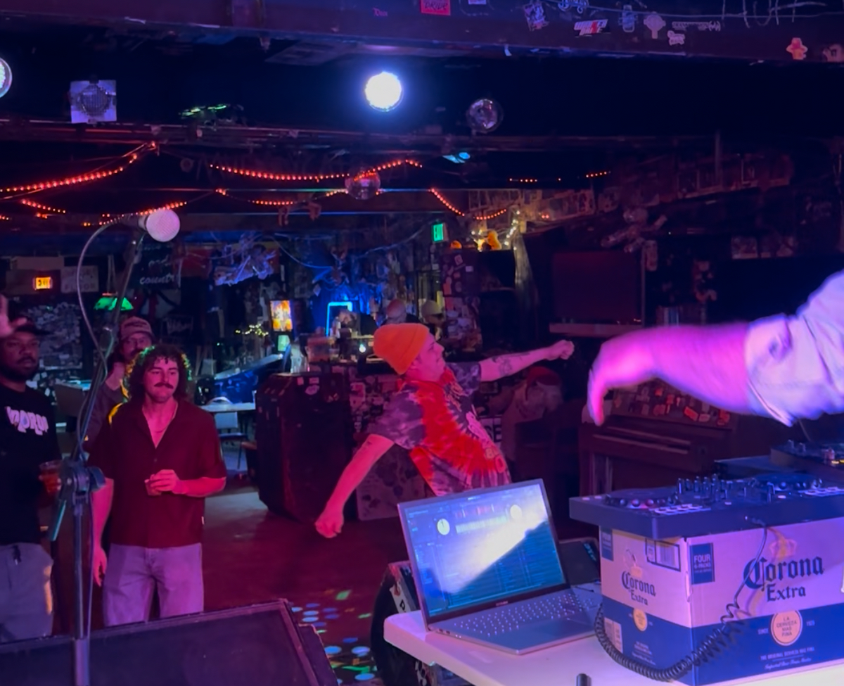 Crowd Dancing and Partying to DJ music at The Nick in Birmingham Alabama.