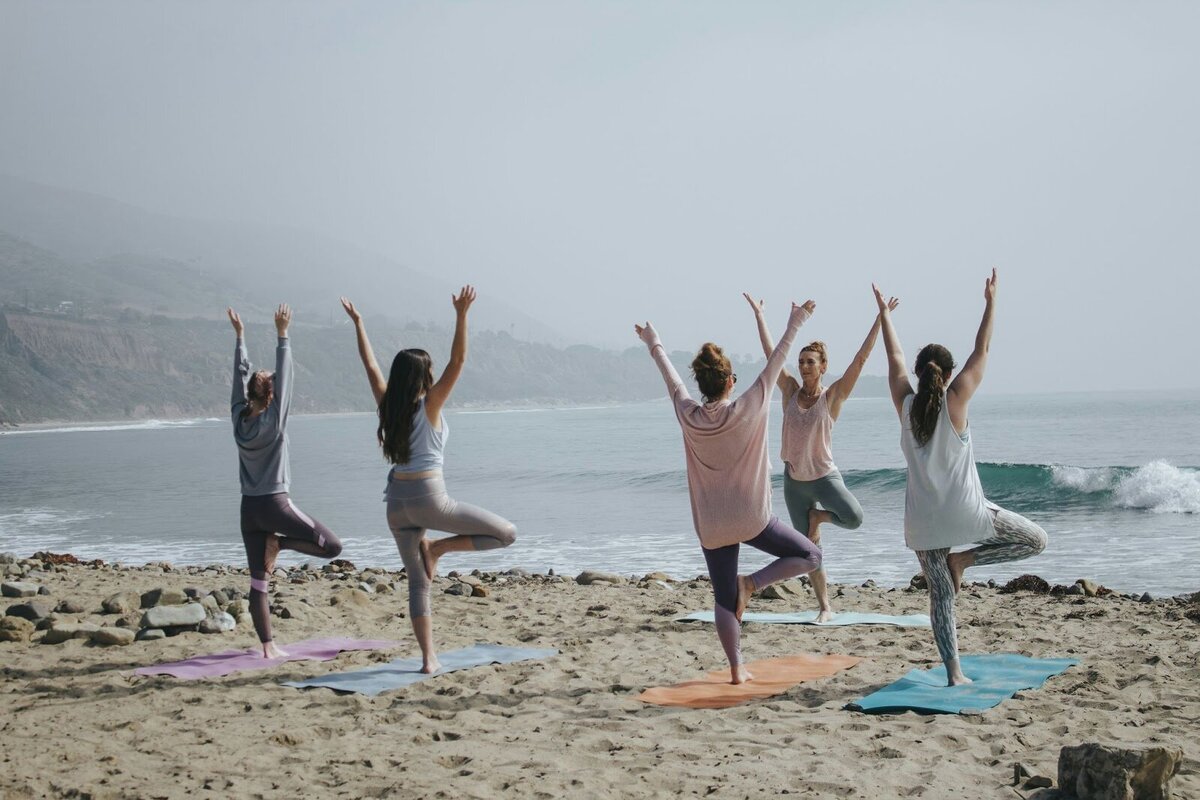 Join a serene morning yoga session on the sandy shores of Baja. Embrace coastal wellness, mindful movement, and community connection with breathtaking ocean views.