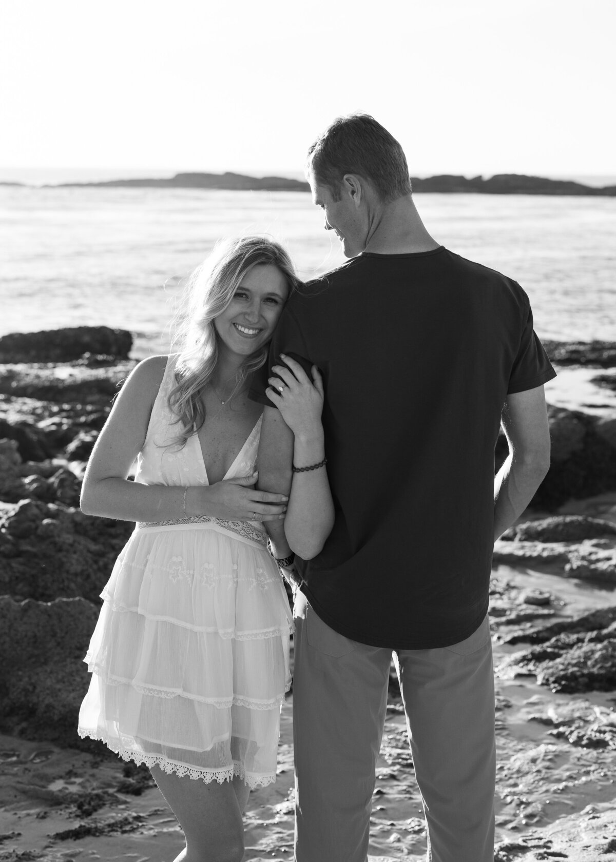 black and white beach engagement photo