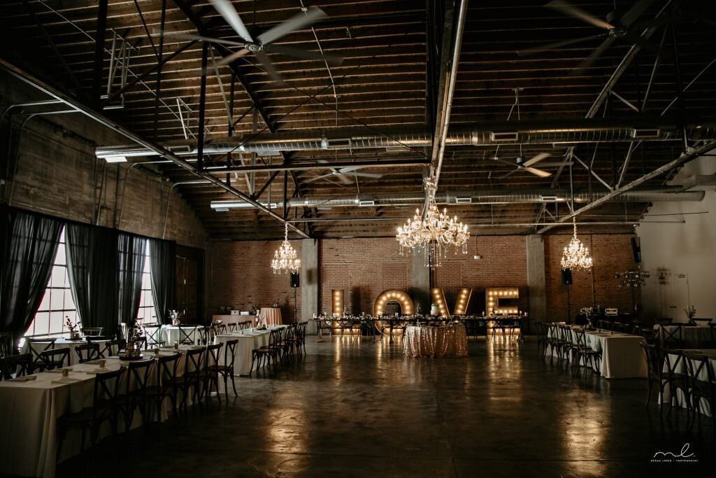 megan-loreg-photography-aj-millee-wedding-brick-and-mortar-venue-love-downtown-wichita-13-1024x683