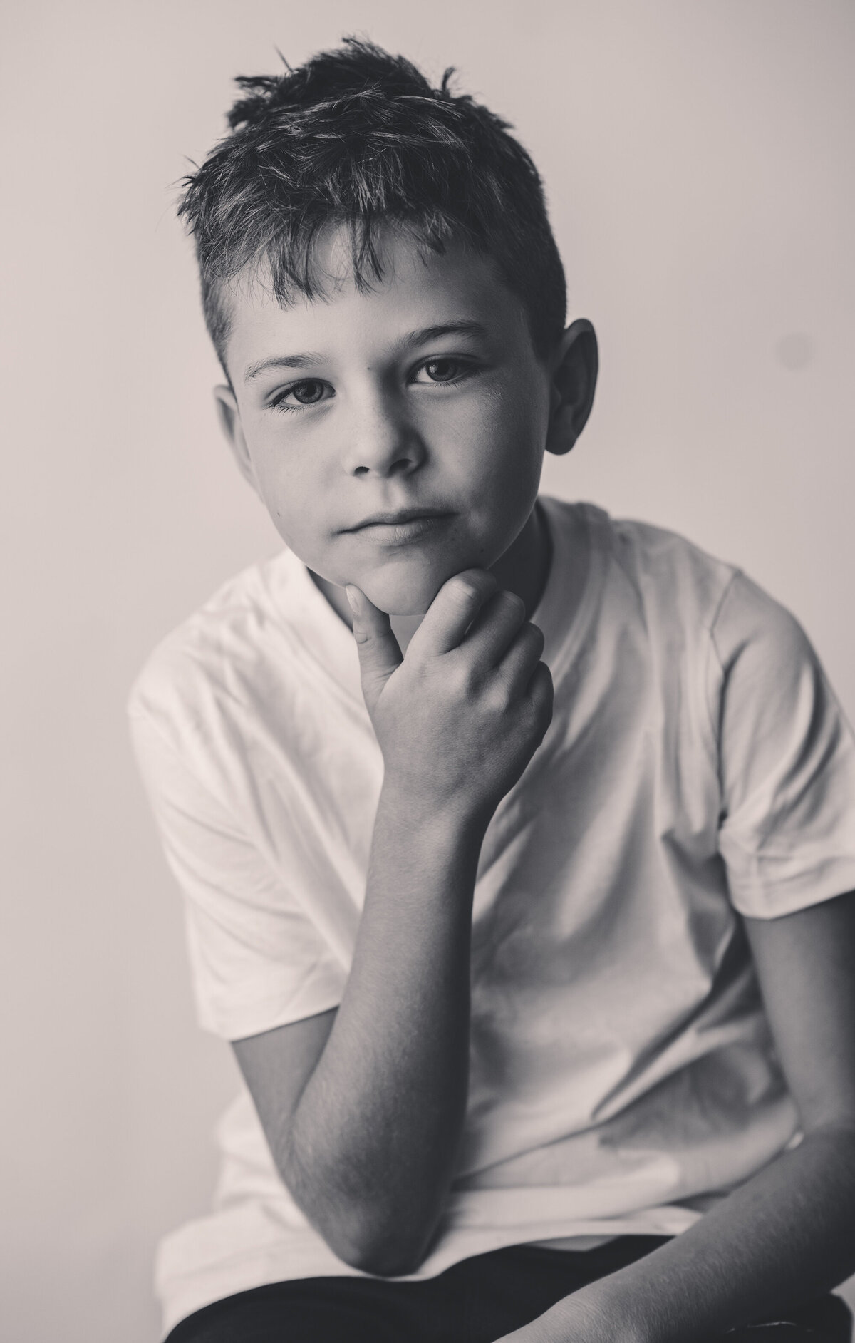 Young boy poses for Personality Portraits in Charleston, South Carolina.