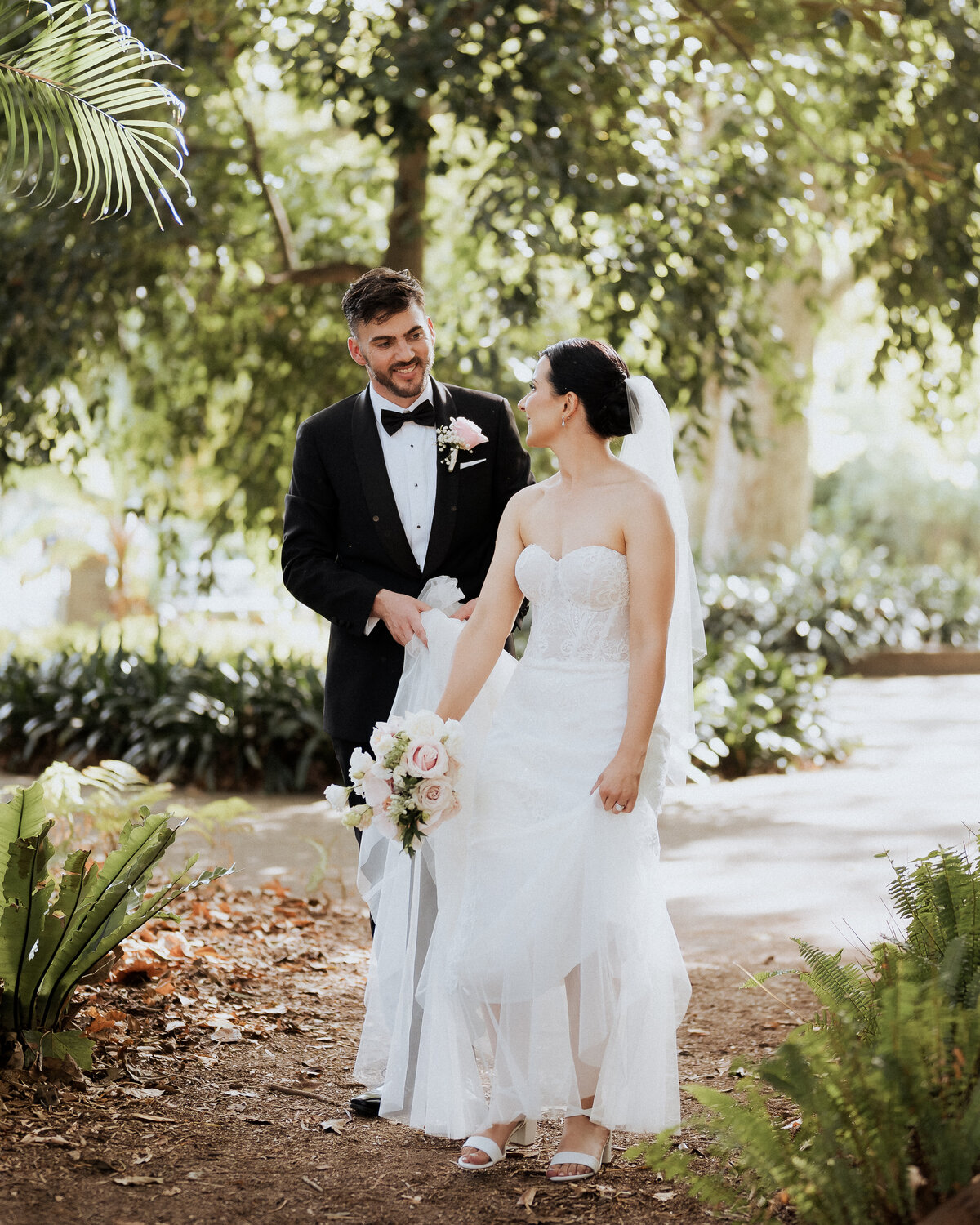 Guests dancing, laughing, and celebrating captured in stunning wedding photography by JakeyVass Media.