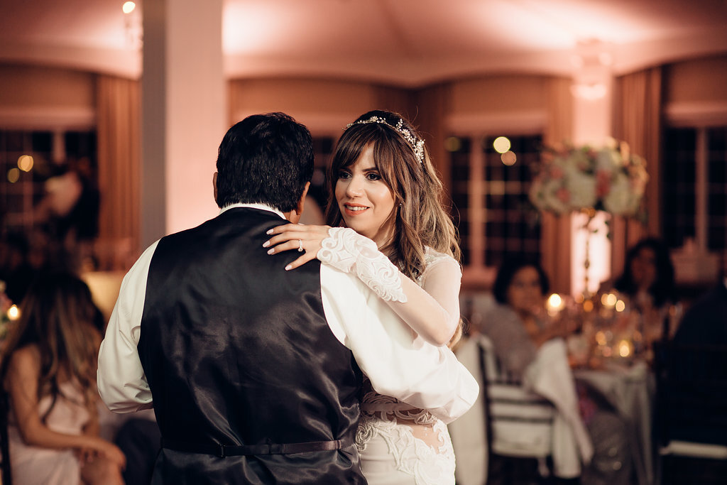 Wedding Photograph Of Bride Smiling While Dancing With A Man Los Angeles