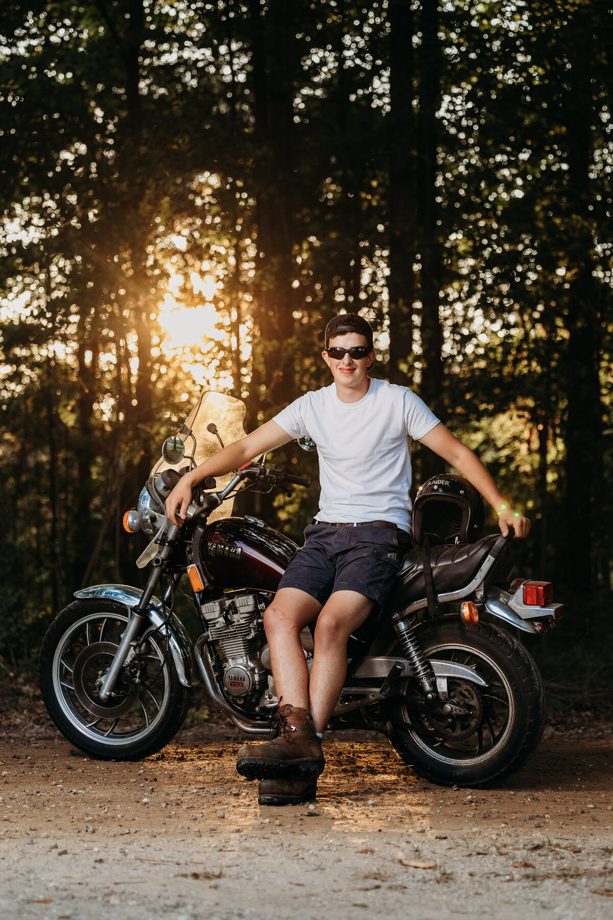 senior-boy-sitting-on-motorcycle