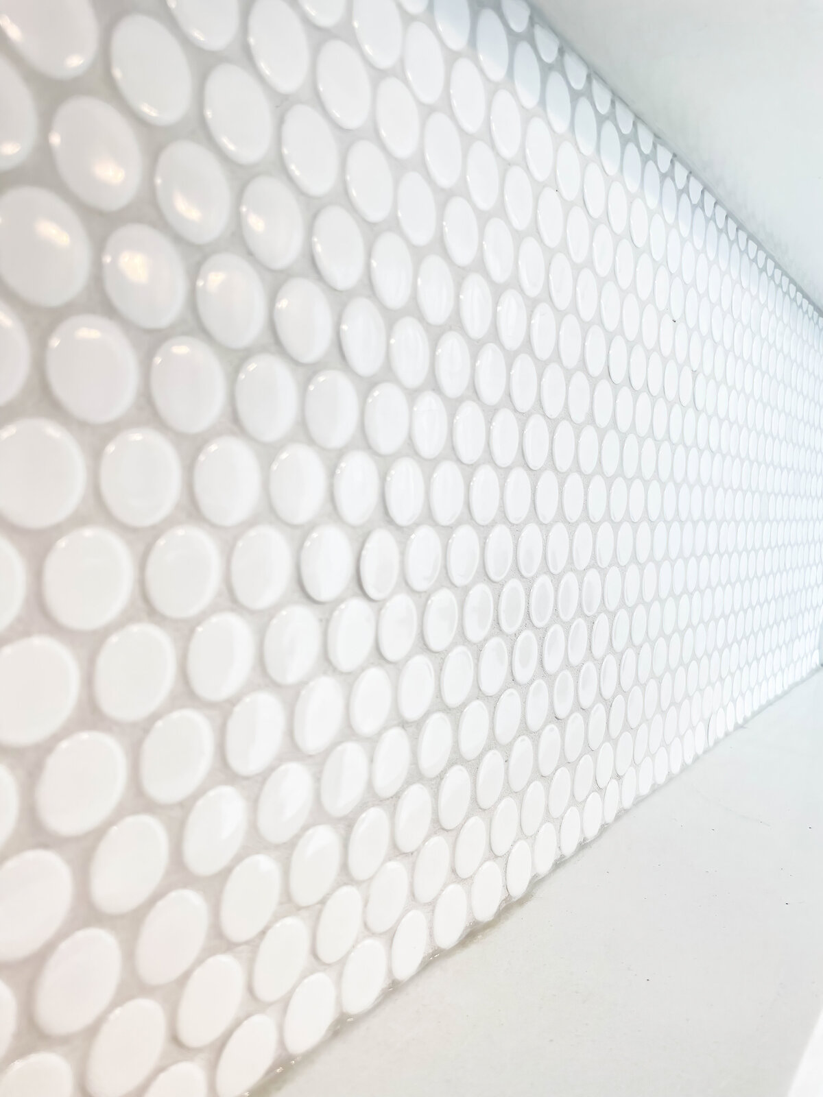white-shower-tile-bathroom